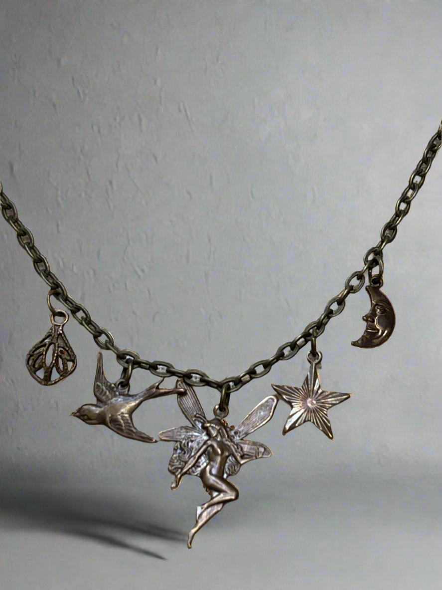 Dainty brass charm necklace